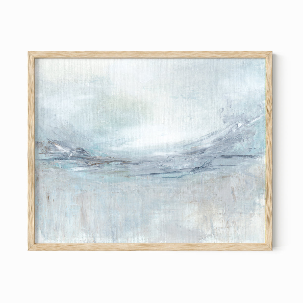 Exhale is an expressive abstract landscape in soft blue, pale gray, muted teal, navy blue, cream, white, and brown, natural oak frame by NLS Design. Large neutral gallery wall art for living rooms, bedrooms, entryways, offices, bathrooms, and above the couch and above the bed. Modern coastal, Nancy Meyers, California coastal, meditative wellness. Horizontal sizes, 8x10, 11x14, 16x20, 18x24, 24x36, 30x40, 40x60 inches. Artwork by NLS Design, nlsdesignllc.com. Real art by a real artist. No AI